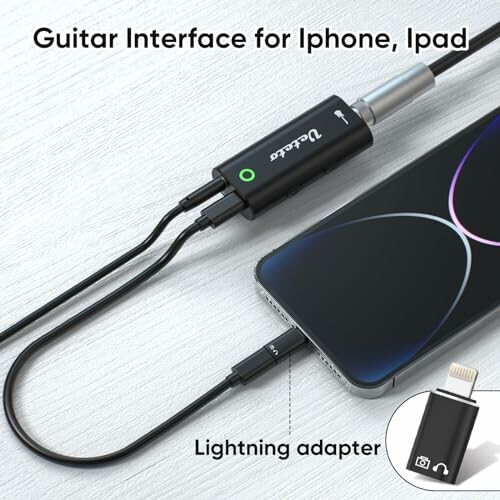 Guitar interface connected to iPhone with lightning adapter.