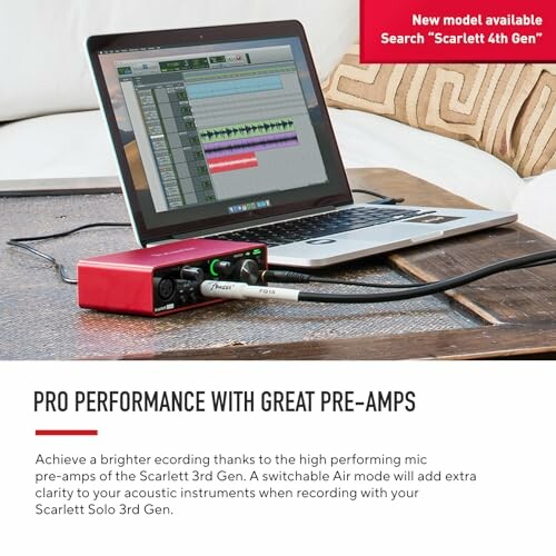 Laptop with audio interface Scarlett Solo 3rd Gen for recording.