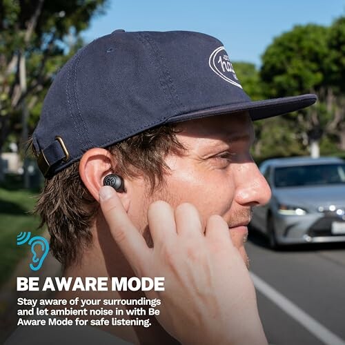 Man using earbuds with Be Aware Mode