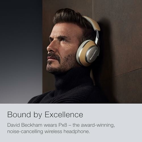 Man wearing noise-cancelling wireless headphones.