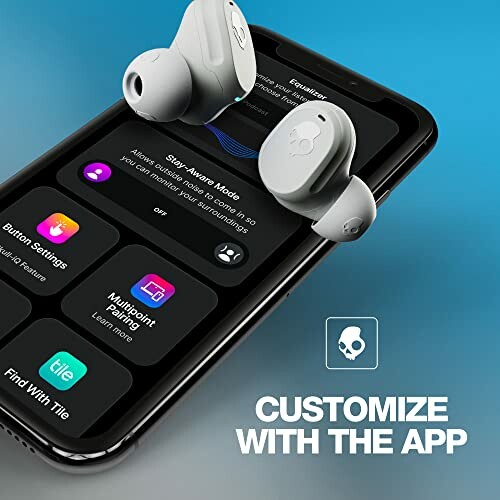 Wireless earbuds on smartphone showing customization app.